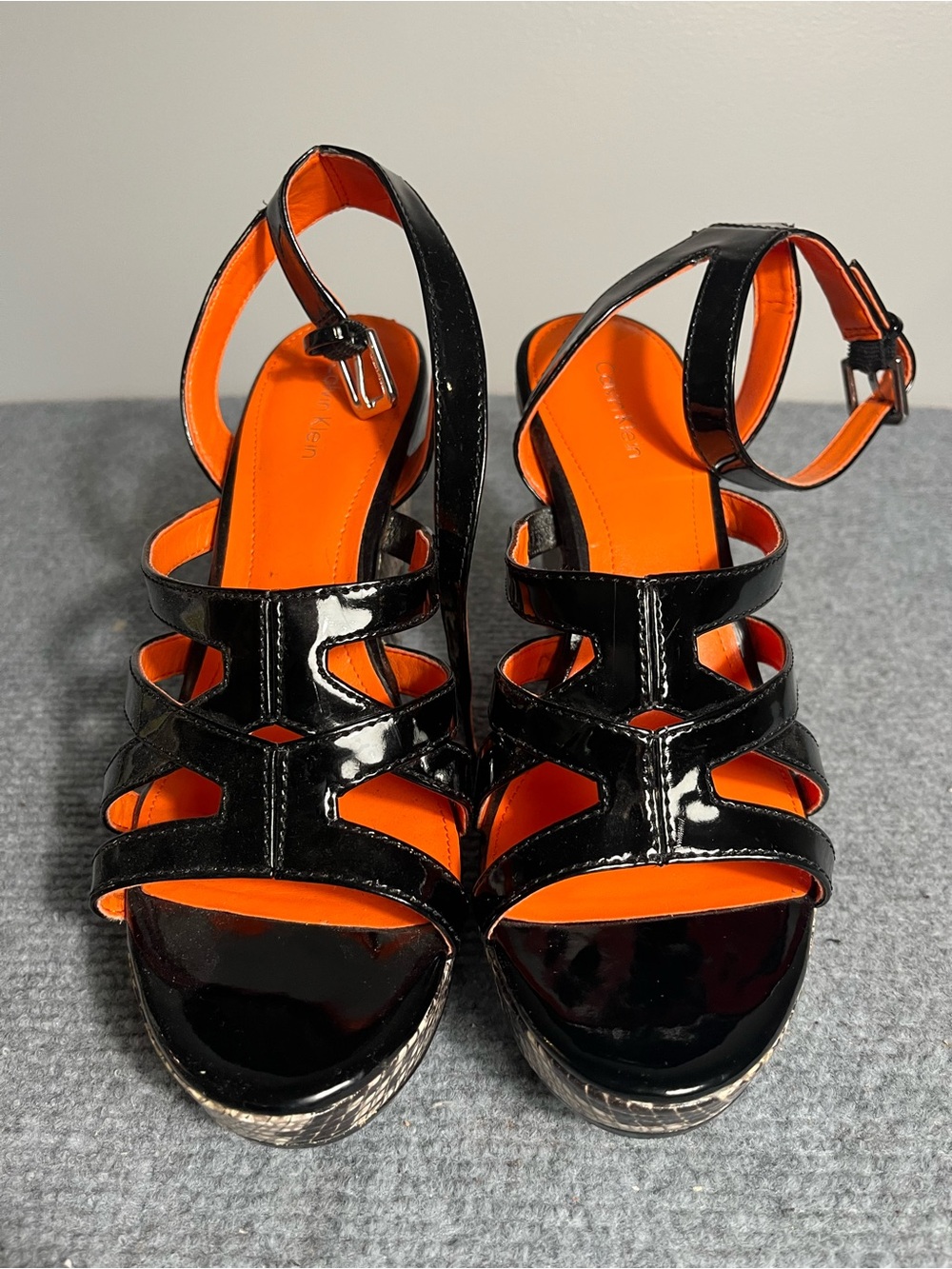 Calvin Klein Black Patent Wedge Sandals. Peeling to inside strap.